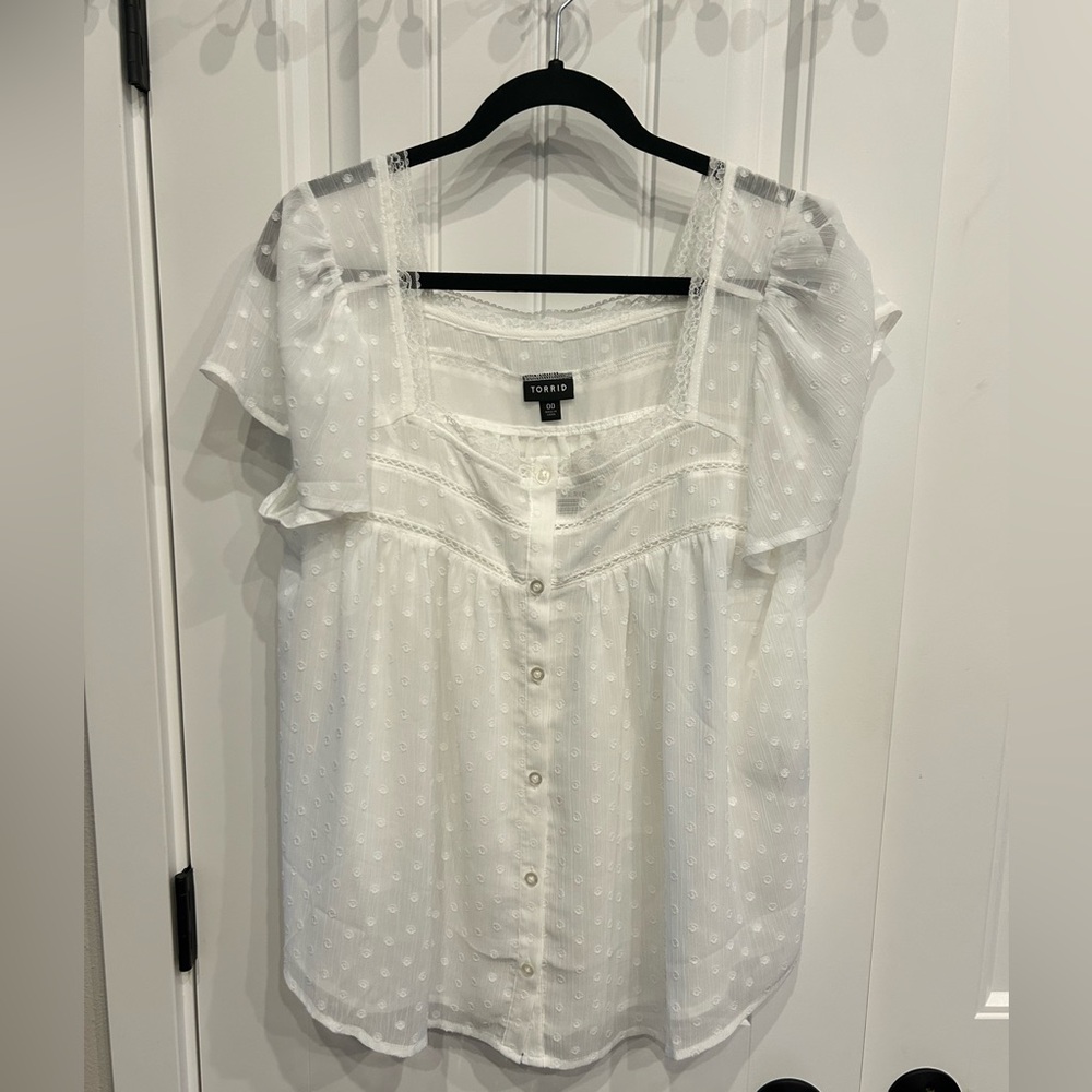 White medium/large Torrid blouse. Brand new with tags